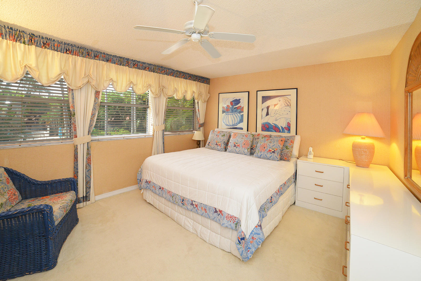 2168 Northwest 53rd Street Boca Raton, FL 33496 - Photo 20 of 31 a spacious bedroom with a large bed and a large window