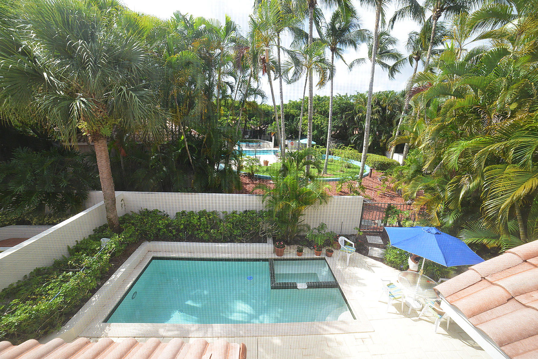 2168 Northwest 53rd Street Boca Raton, FL 33496 - Photo 23 of 31 a view of a backyard