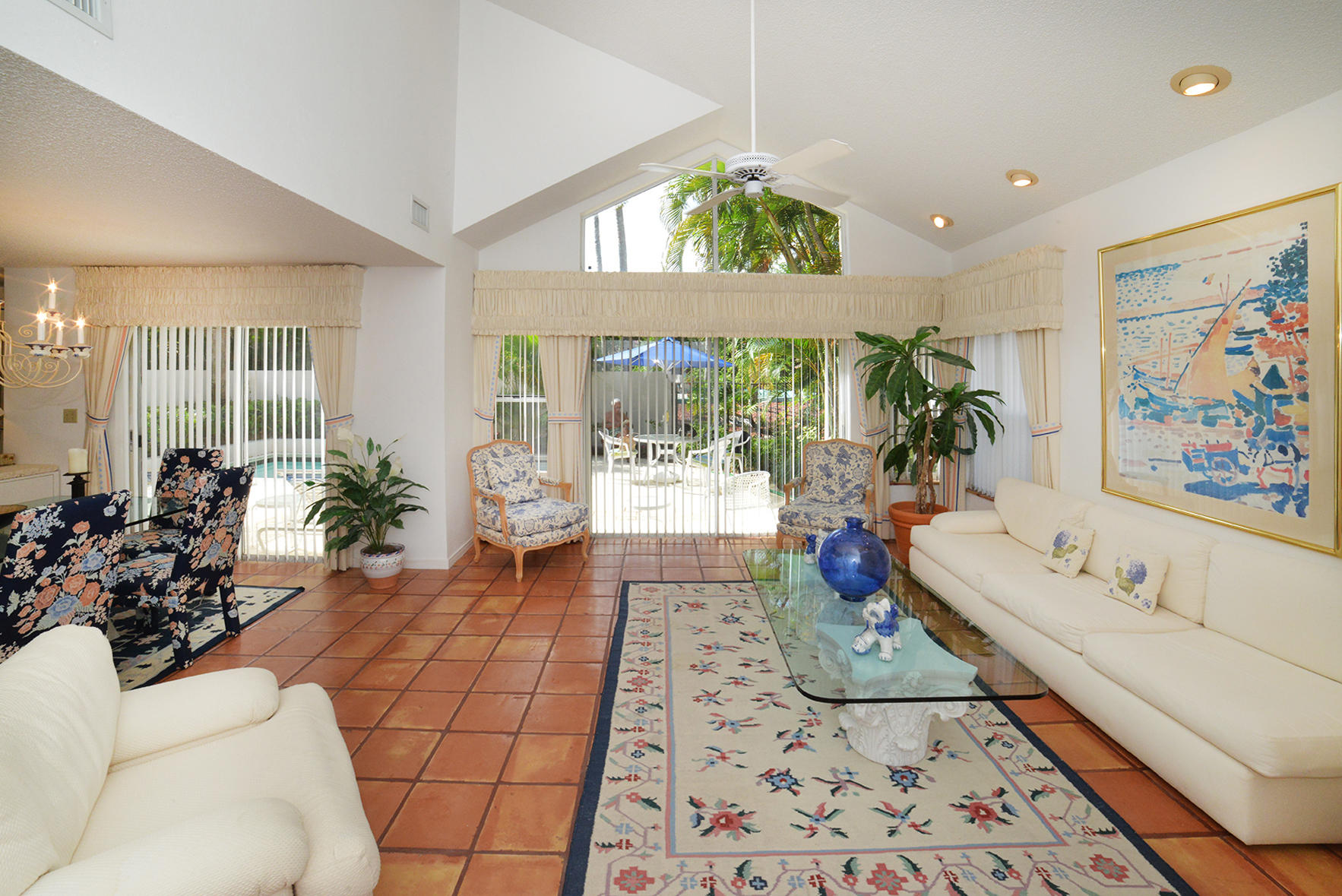 2168 Northwest 53rd Street Boca Raton, FL 33496 - Photo 3 of 31 a living room with furniture and a large window