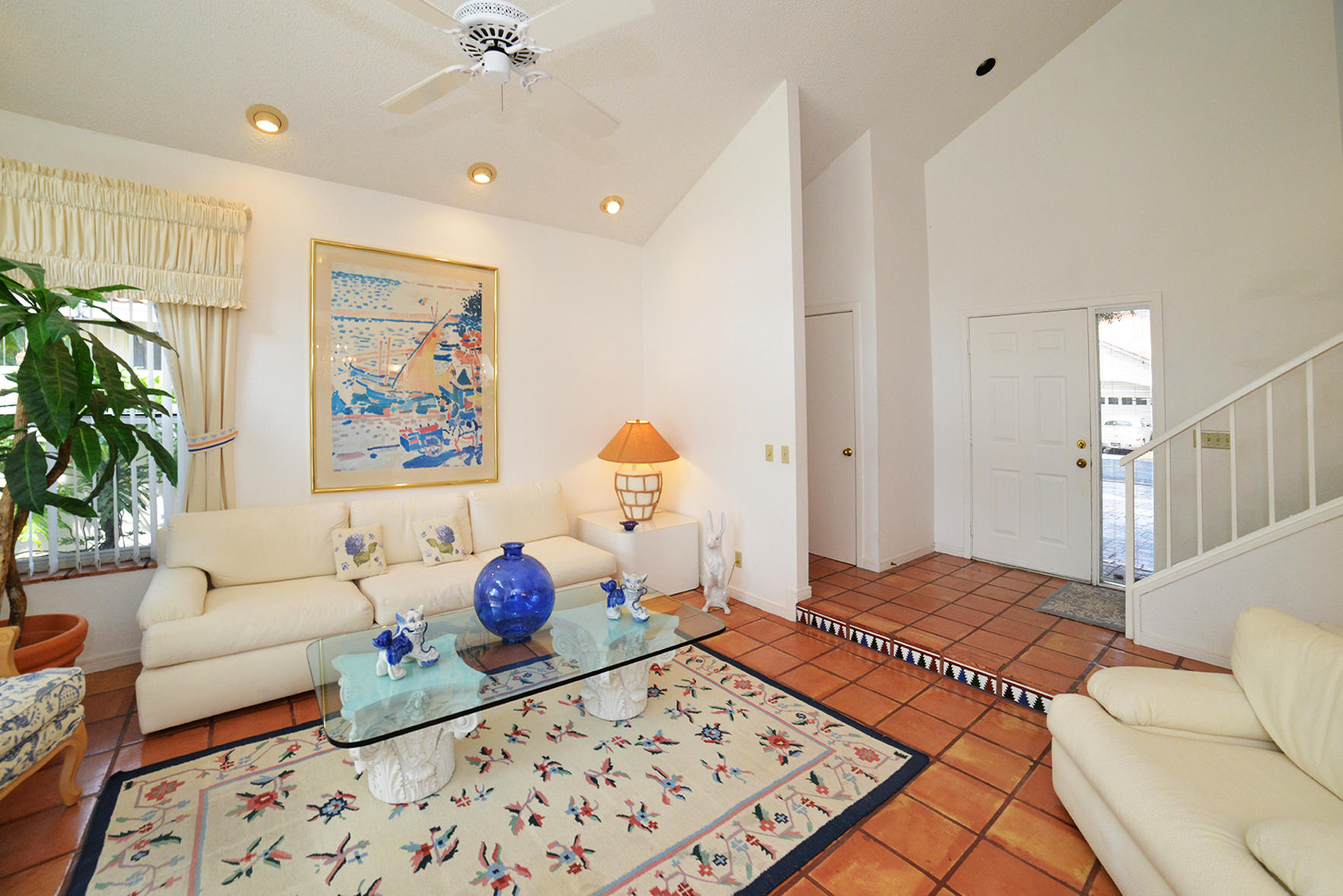 2168 Northwest 53rd Street Boca Raton, FL 33496 - Photo 5 of 31 a bedroom with a bed and a painting on the wall