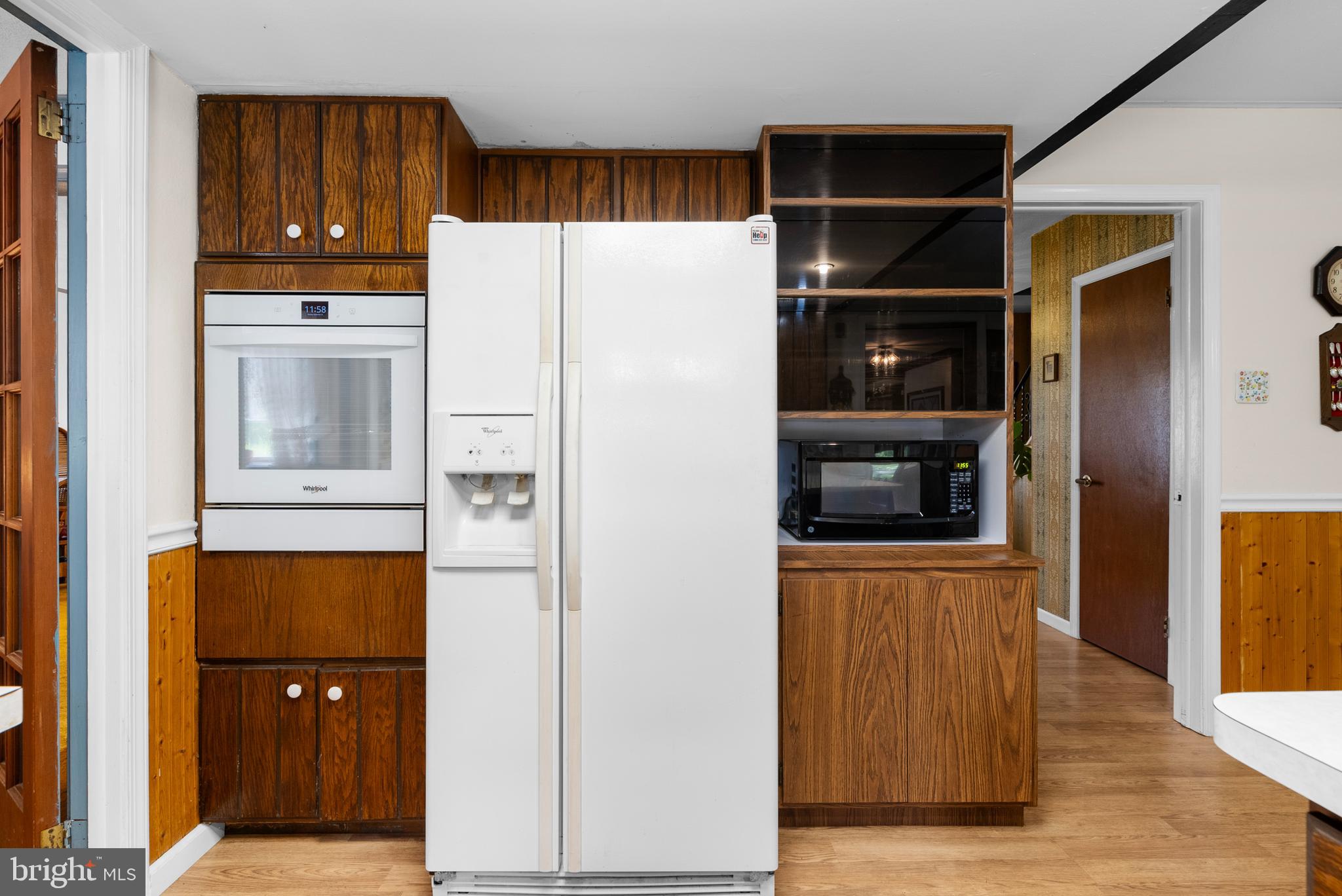 2235 South County Line Road Telford, PA 18969 - Photo 11 of 63 a white refrigerator freezer and a wooden floor