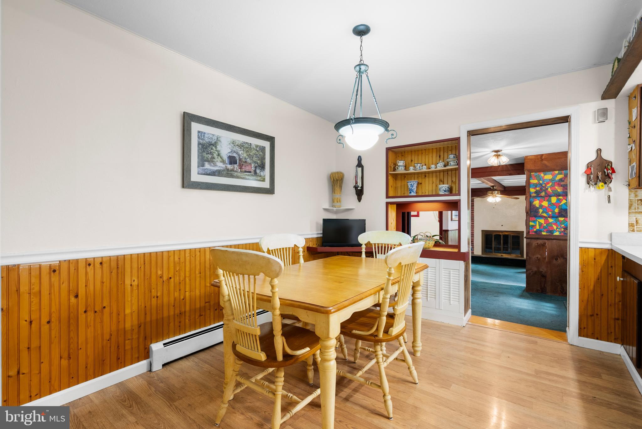 2235 South County Line Road Telford, PA 18969 - Photo 13 of 63 a view of a dining room with furniture and wooden floor