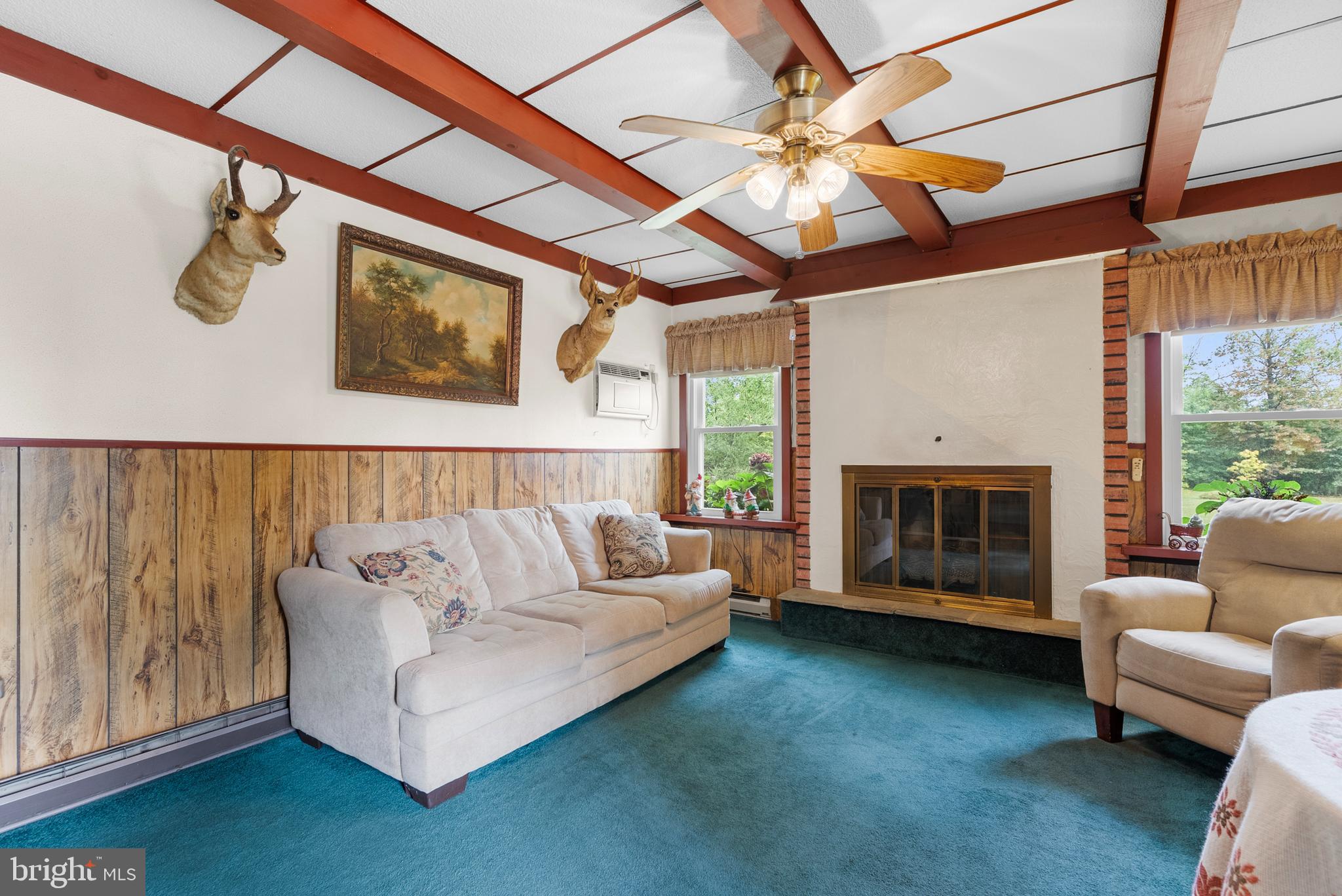 2235 South County Line Road Telford, PA 18969 - Photo 14 of 63 a living room with furniture and a fireplace