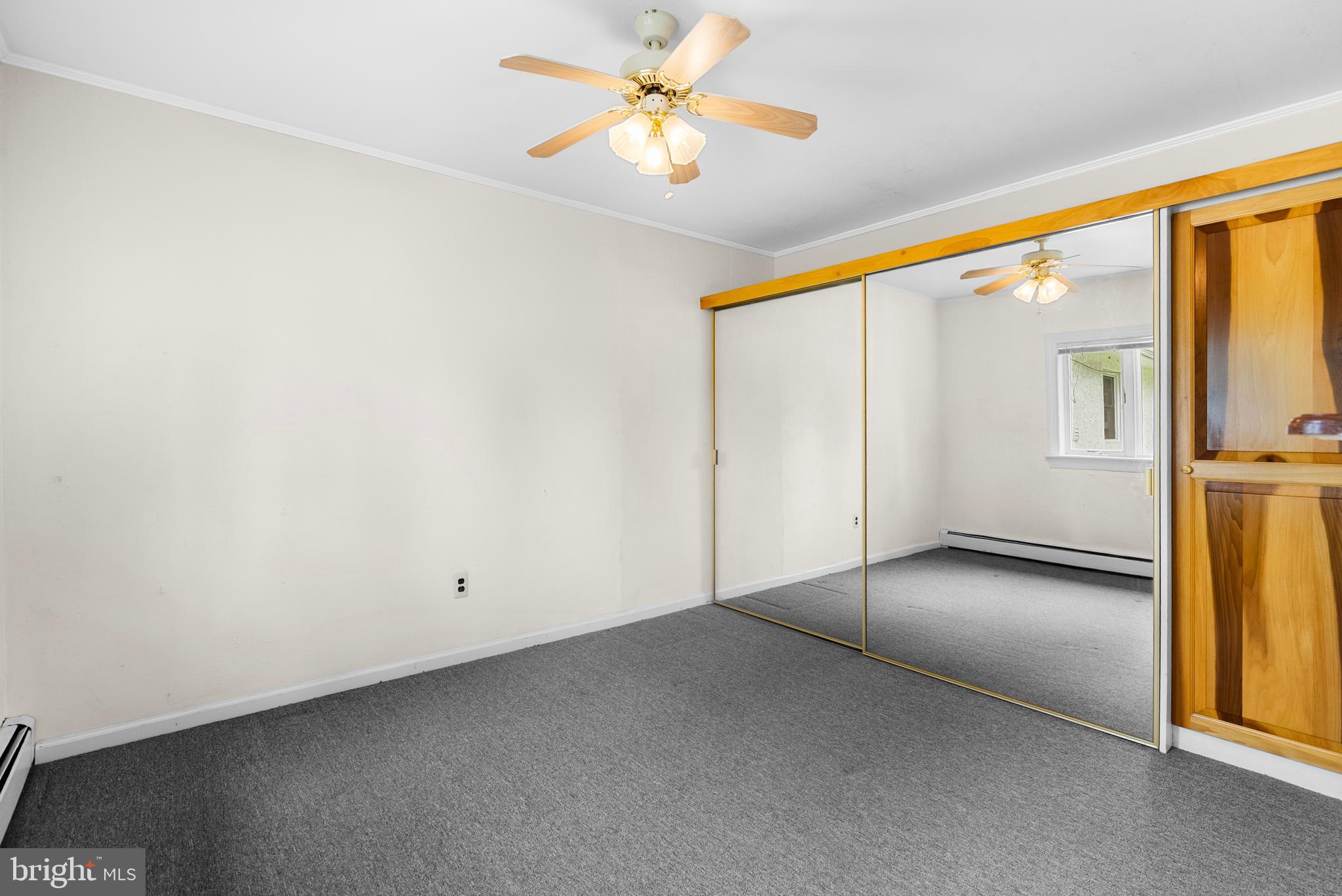 2235 South County Line Road Telford, PA 18969 - Photo 42 of 63 an empty room with windows and fan