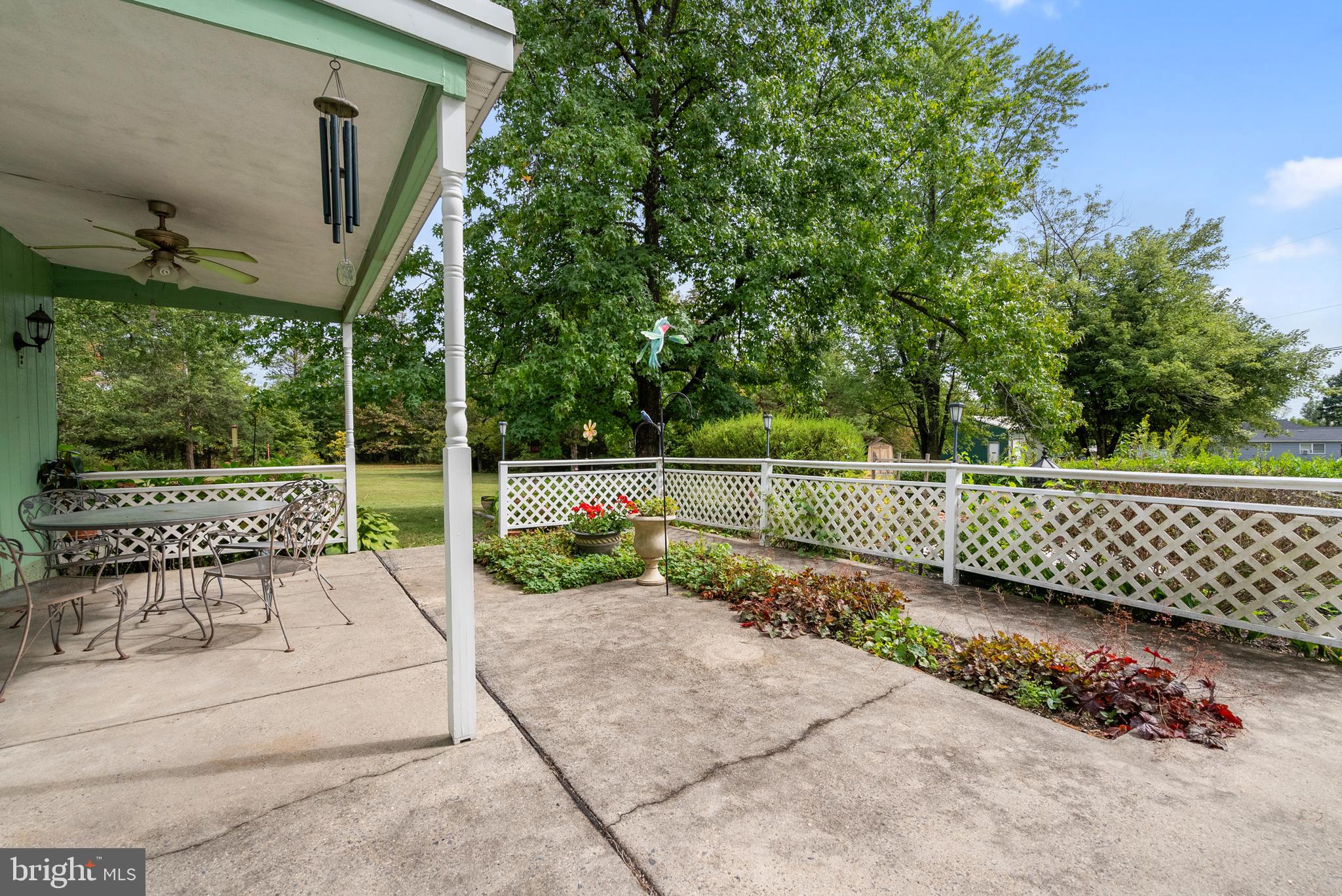 2235 South County Line Road Telford, PA 18969 - Photo 48 of 63 a view of a garden with a bench in the patio