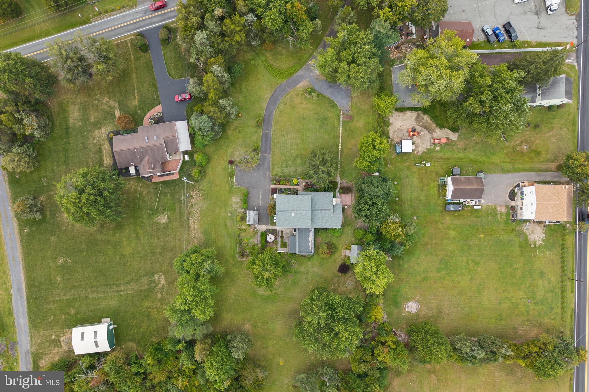 2235 South County Line Road Telford, PA 18969 - Photo 57 of 63 an aerial view of residential house with outdoor space and swimming pool