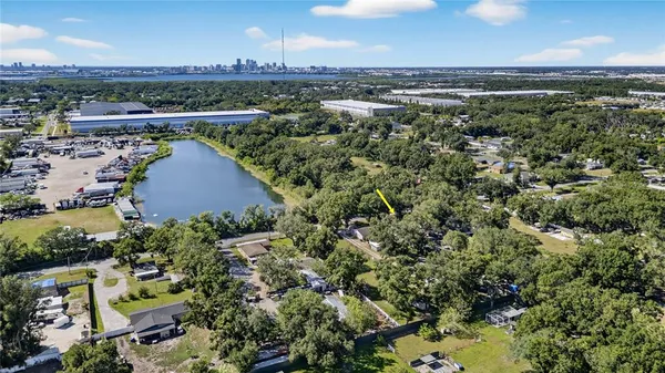 a view of a tree in front of a house