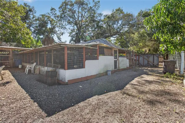 a view of backyard with green space