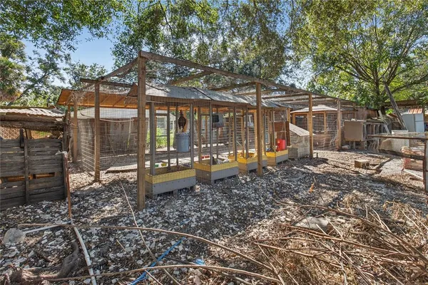 a view of a yard with patio