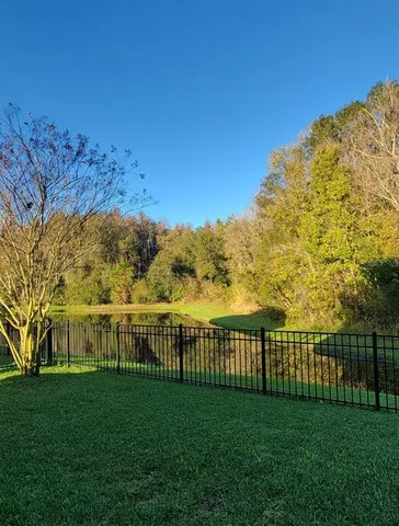 a view of a backyard with a garden