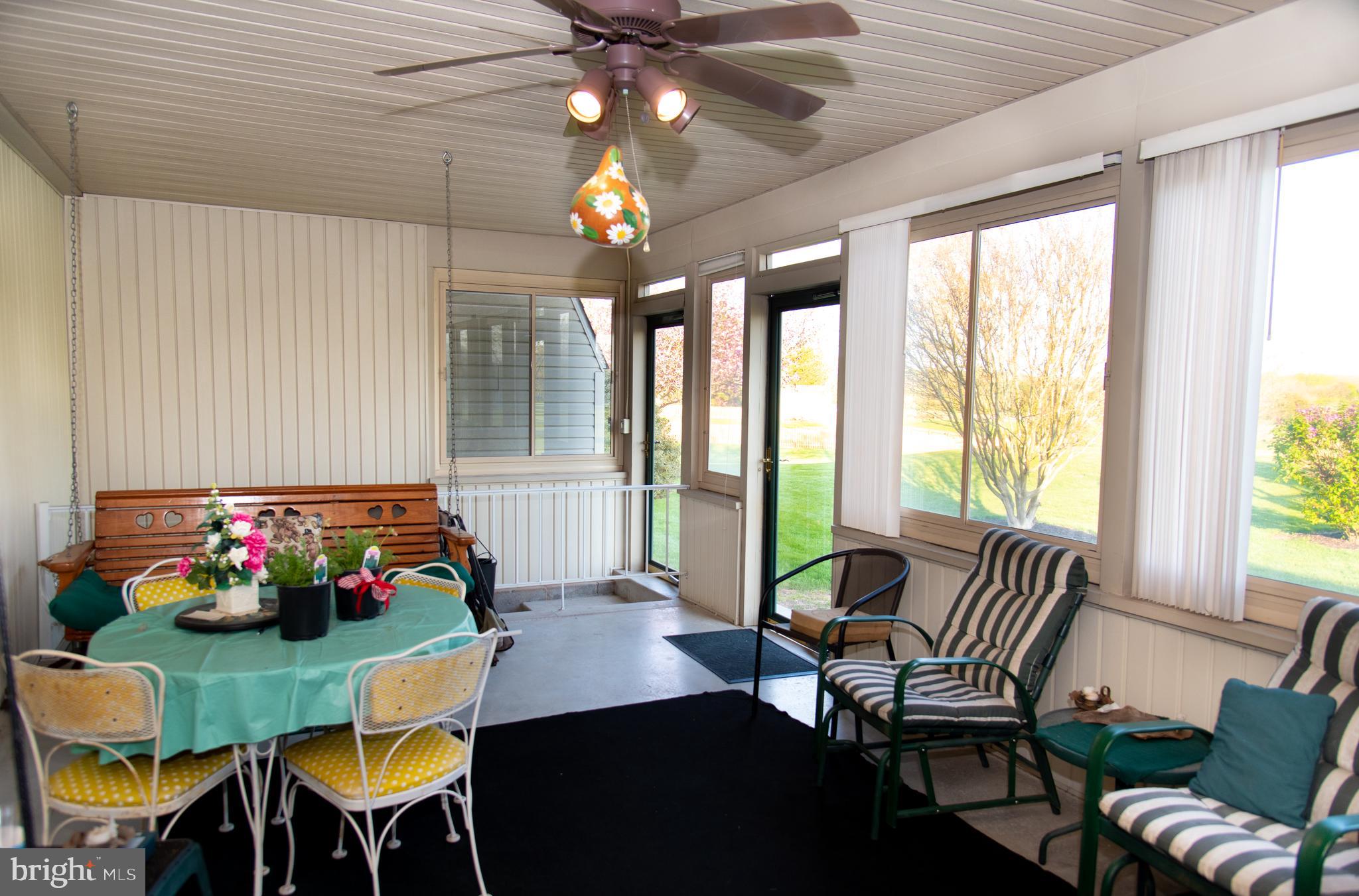 2165 Harney Road Littlestown, PA 17340 - Photo 36 of 54 Sun porch/enclosed patio/access to basement