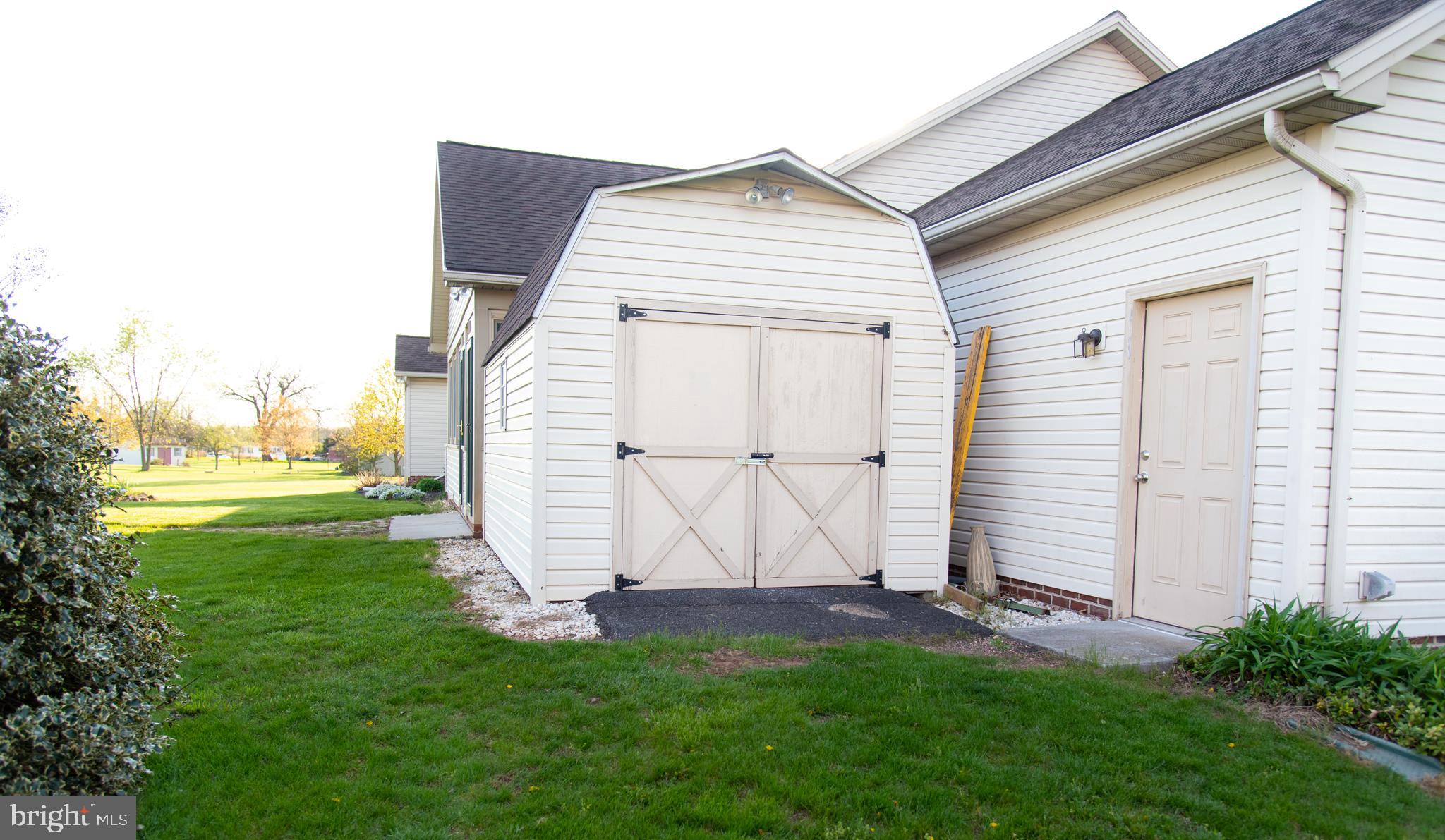 2165 Harney Road Littlestown, PA 17340 - Photo 50 of 54 Garage door to back of house/shed