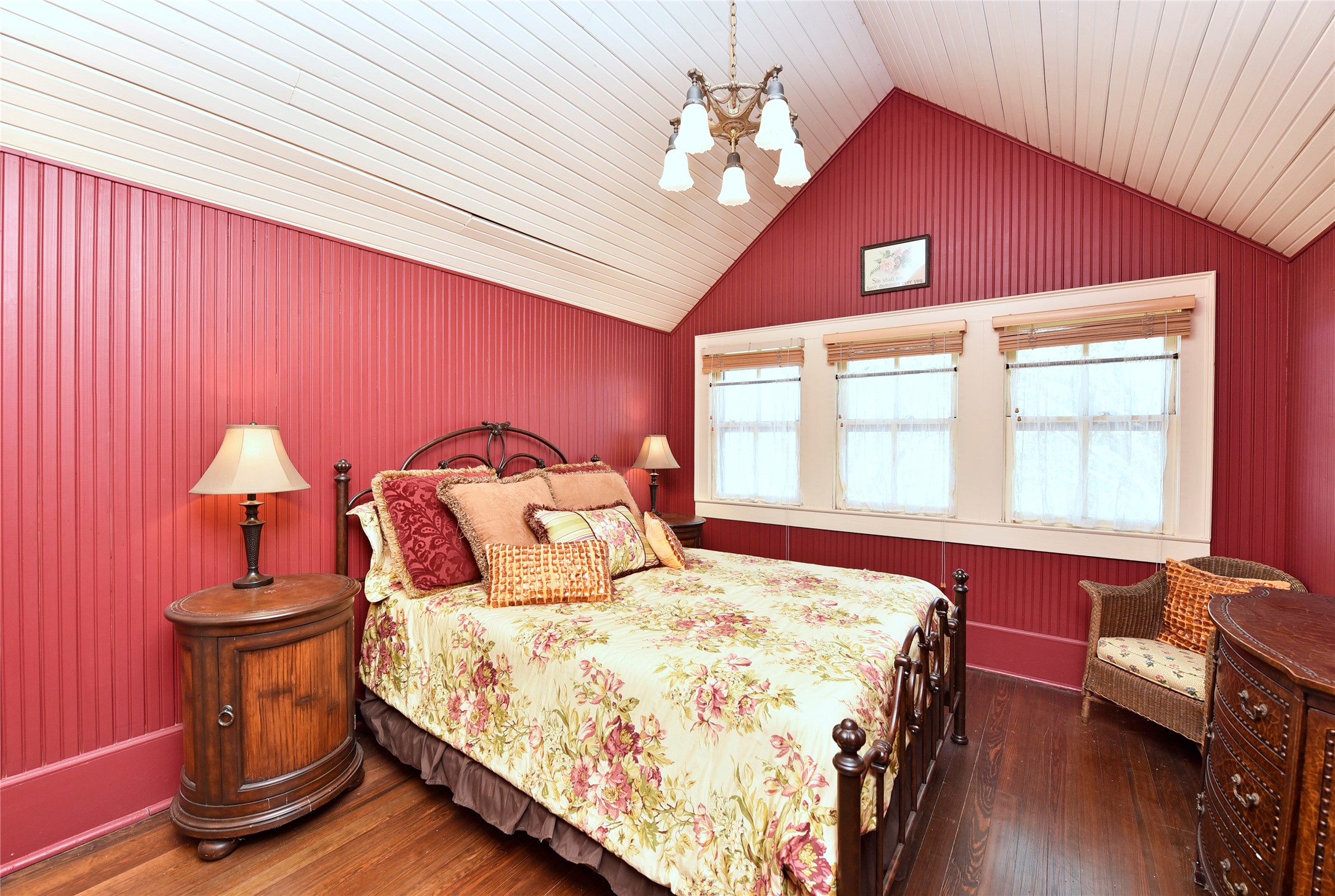 315 Cedar Street New Ulm, TX 78950 - Photo 23 of 50 a bedroom with a bed and wooden floor