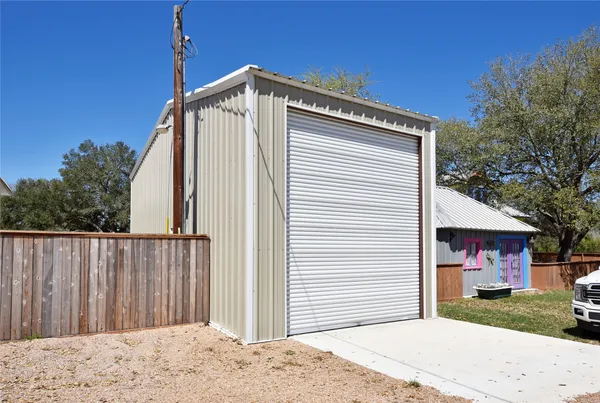 a front view of a house with a garage
