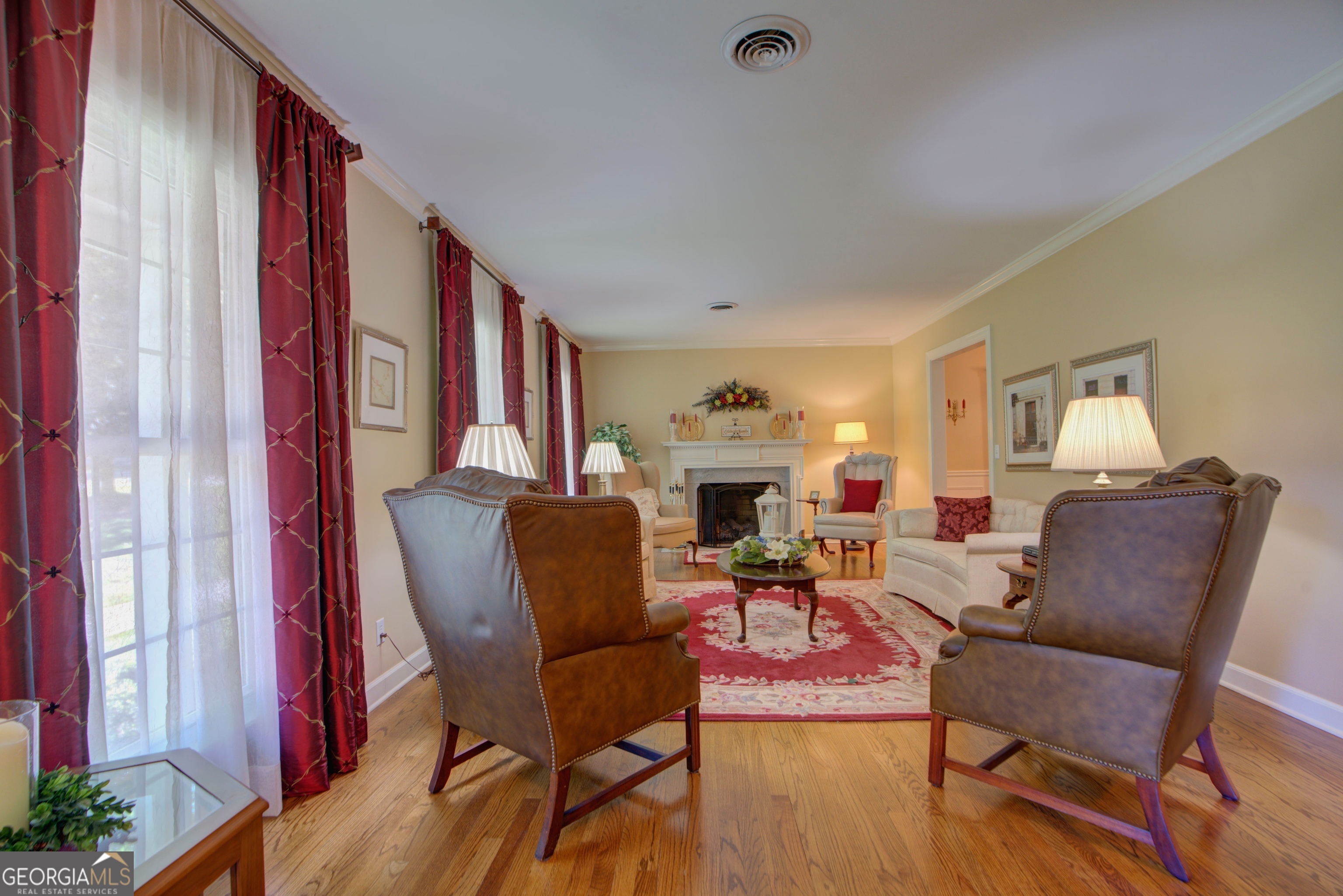 204 Green View Road Southwest Rome, GA 30165 - Photo 23 of 62 a living room with furniture and a fireplace