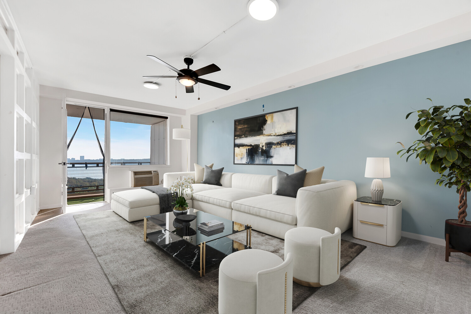 5700 Arlington Avenue, Unit 22R Bronx, NY 10471 - Photo 2 of 14 a living room with furniture a chandelier and a large window