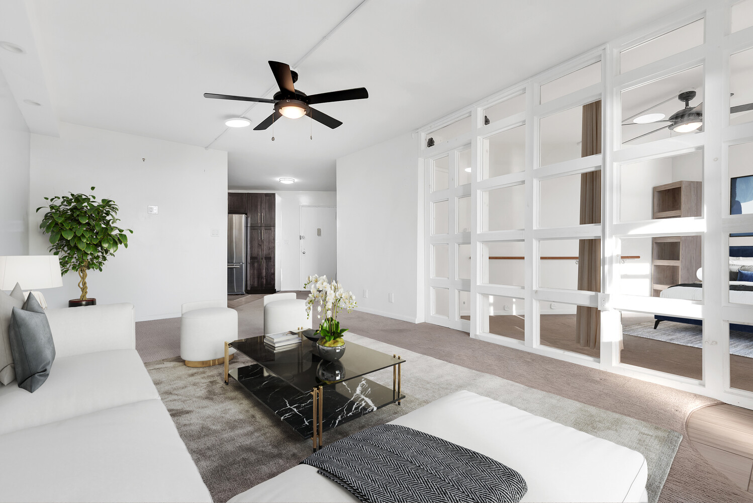 5700 Arlington Avenue, Unit 22R Bronx, NY 10471 - Photo 5 of 14 a living room with furniture potted plant and a chandelier