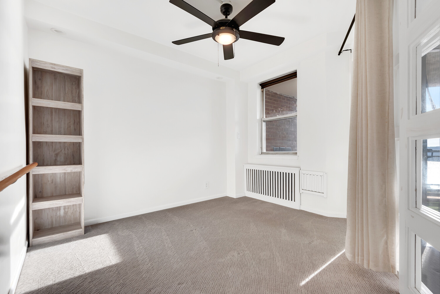 5700 Arlington Avenue, Unit 22R Bronx, NY 10471 - Photo 8 of 14 a view of an empty room with a window