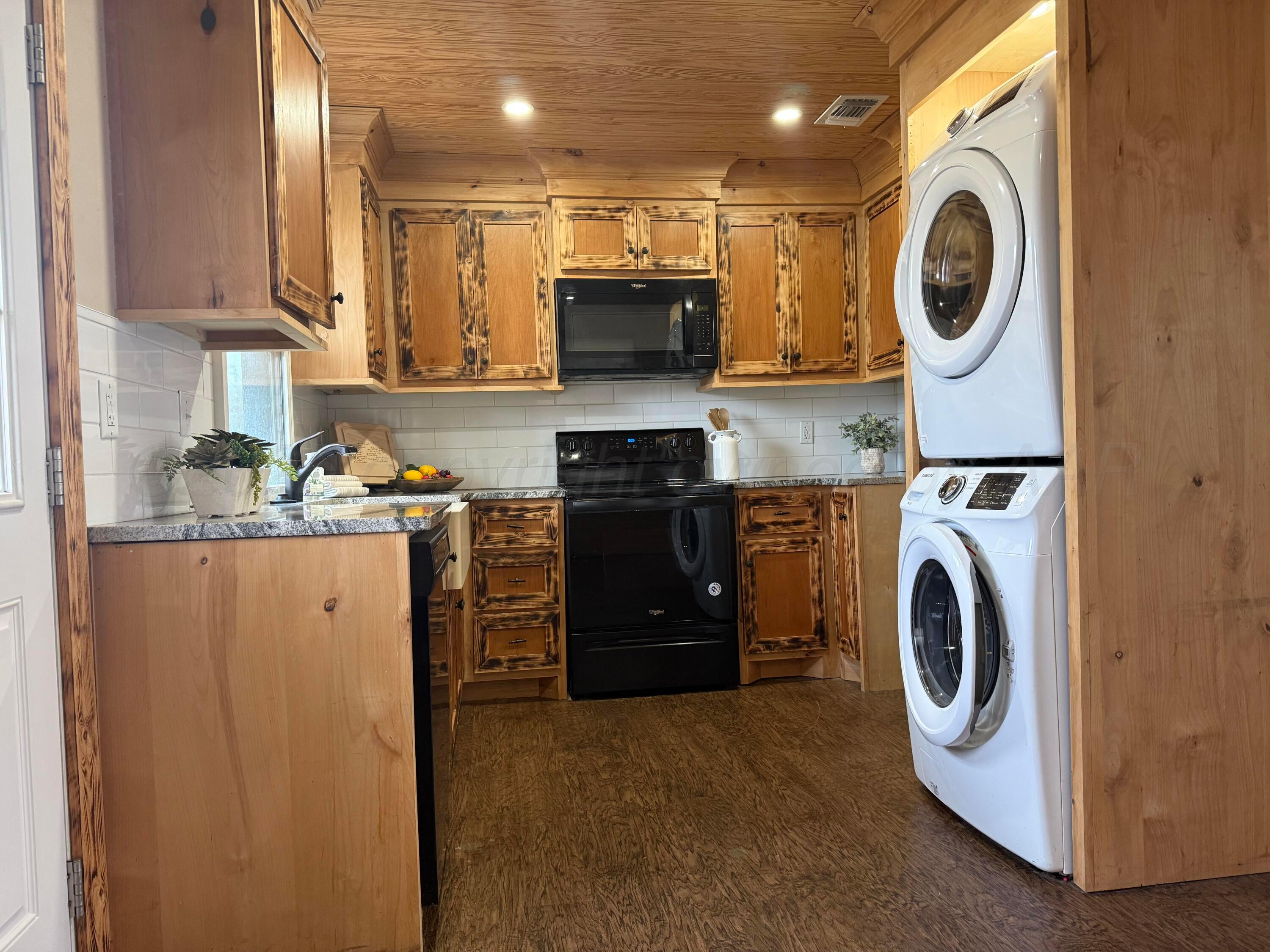 701 East 3rd Street Dumas, TX 79029 - Photo 3 of 14 a view of a kitchen with a sink