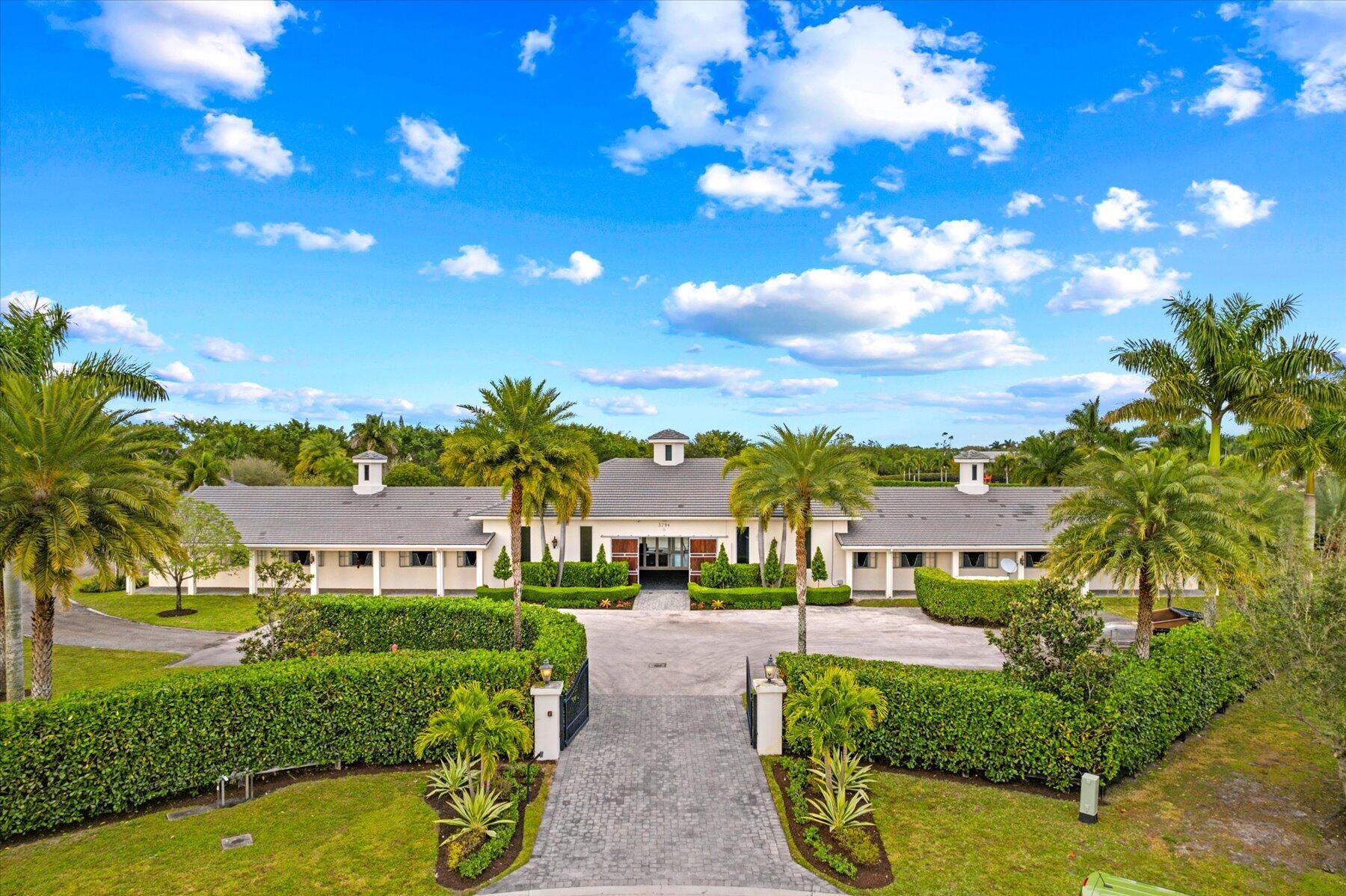 3794 Shutterfly Way Wellington, FL 33414 - Photo 86 of 92 103-125-DJI_0804-Edit