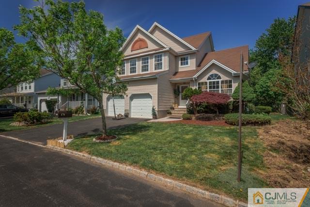 46 Springfield Road North Brunswick, NJ 08902 - Photo 1 of 1 a front view of a house with a yard and garage