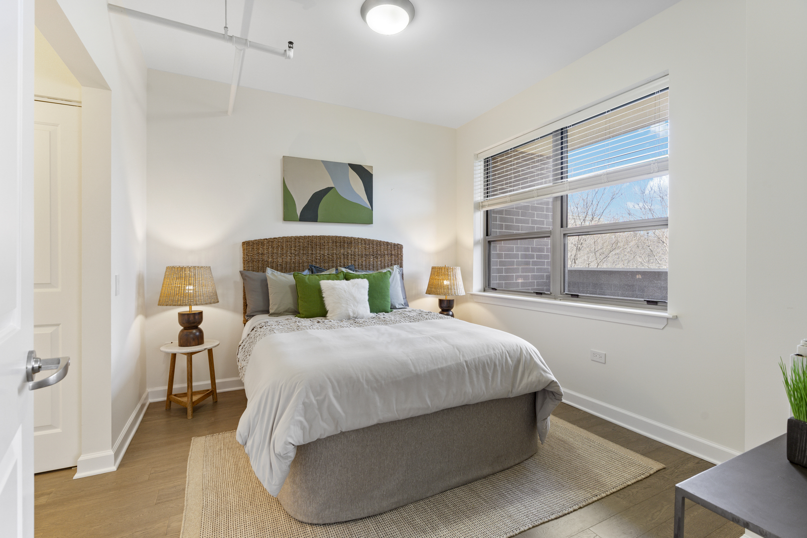 437 West Division Street, Unit 310 Chicago, IL 60610 - Photo 13 of 23 a bedroom with a bed and window