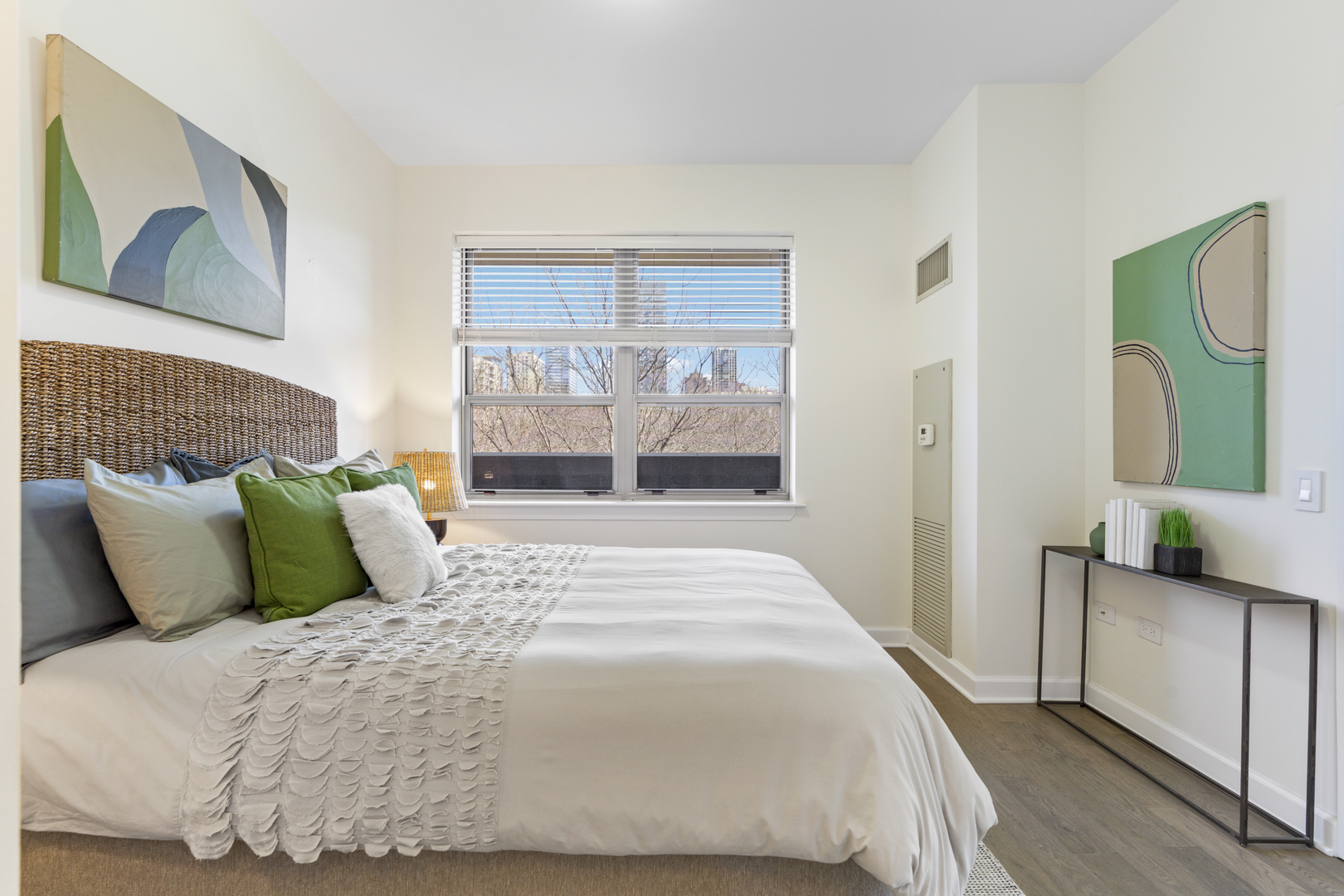 437 West Division Street, Unit 310 Chicago, IL 60610 - Photo 15 of 23 a bedroom with a bed and window