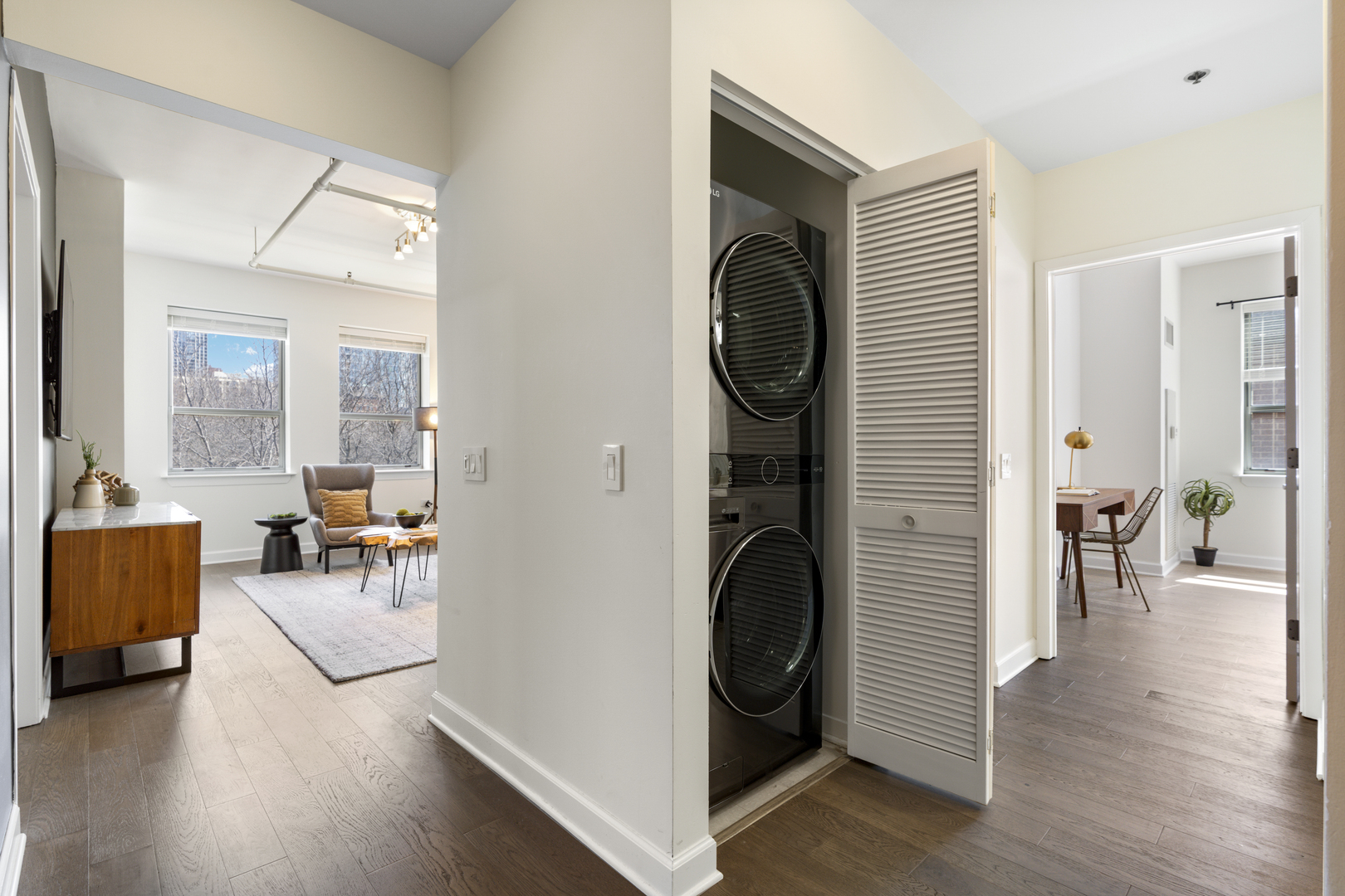437 West Division Street, Unit 310 Chicago, IL 60610 - Photo 3 of 23 a view of livingroom with furniture and wooden floor