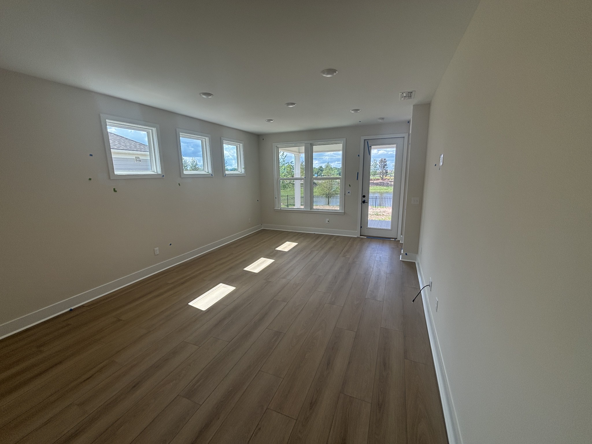 532 Scarlet Oak Road Lebanon, TN 37090 - Photo 33 of 40 a view of an empty room with wooden floor and a window