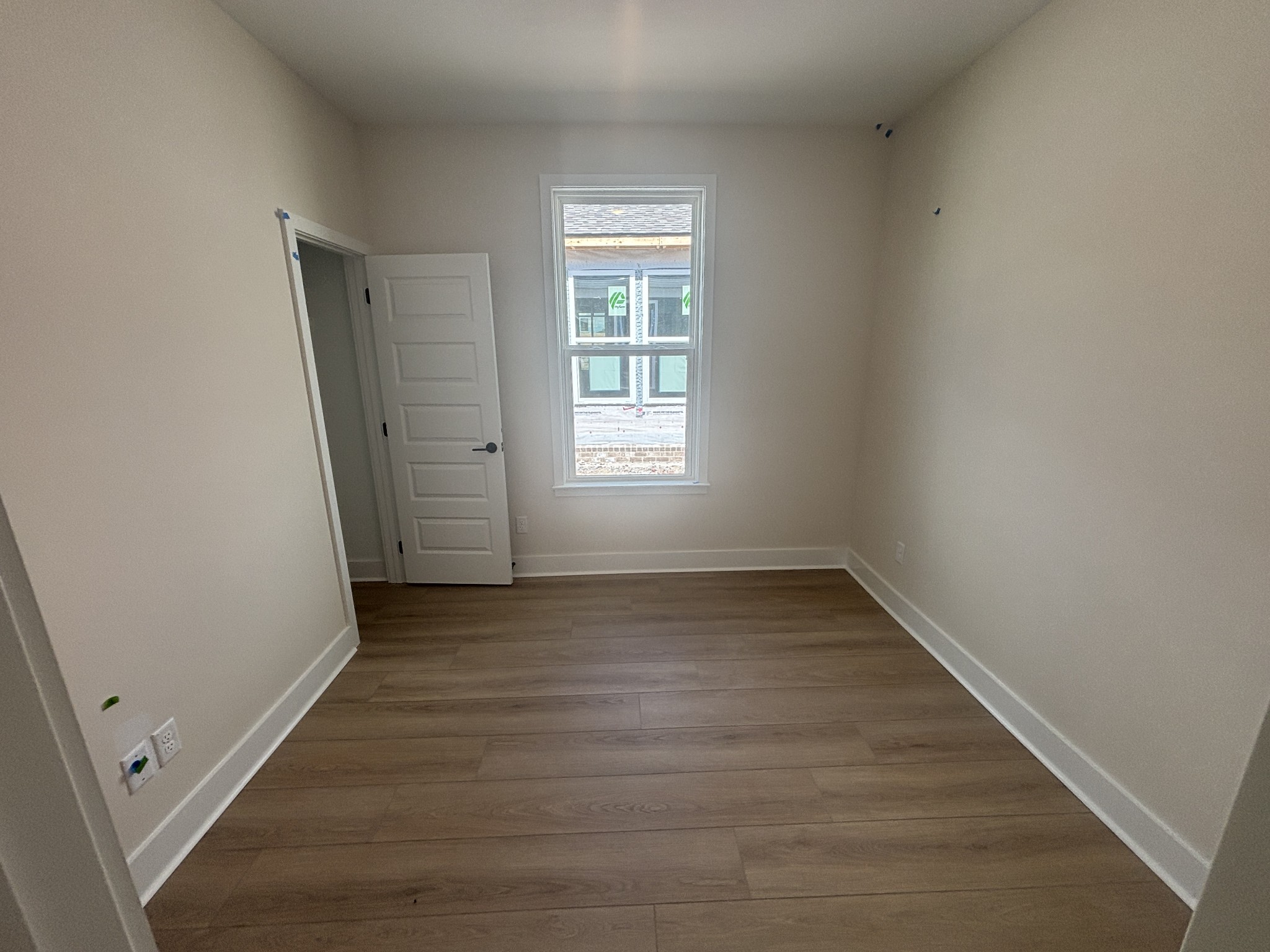 532 Scarlet Oak Road Lebanon, TN 37090 - Photo 35 of 40 a view of an empty room with wooden floor and a window