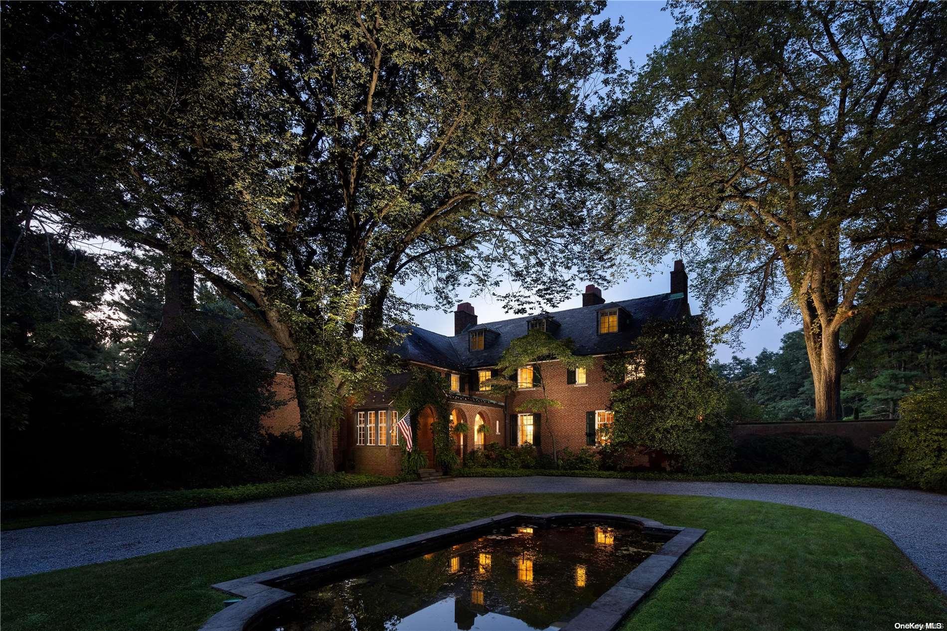 71 Old Tappan Road Locust Valley, NY 11560 - Photo 1 of 1 a view of a park that has a large tree