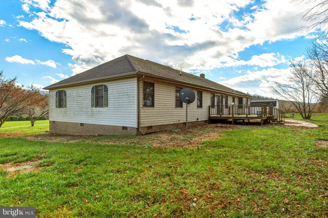 a view of a house with a deck
