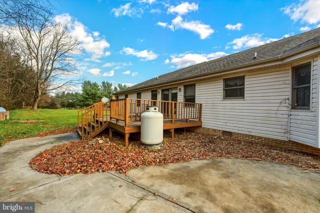 a view of pathway with a wrought fence
