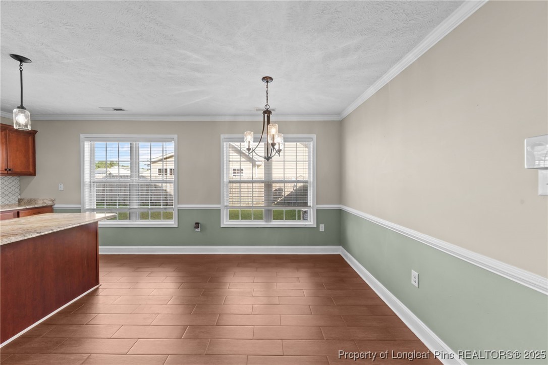 619 Cape Fear Road Raeford, NC 28376 - Photo 12 of 23 a view of kitchen with window and wooden floor