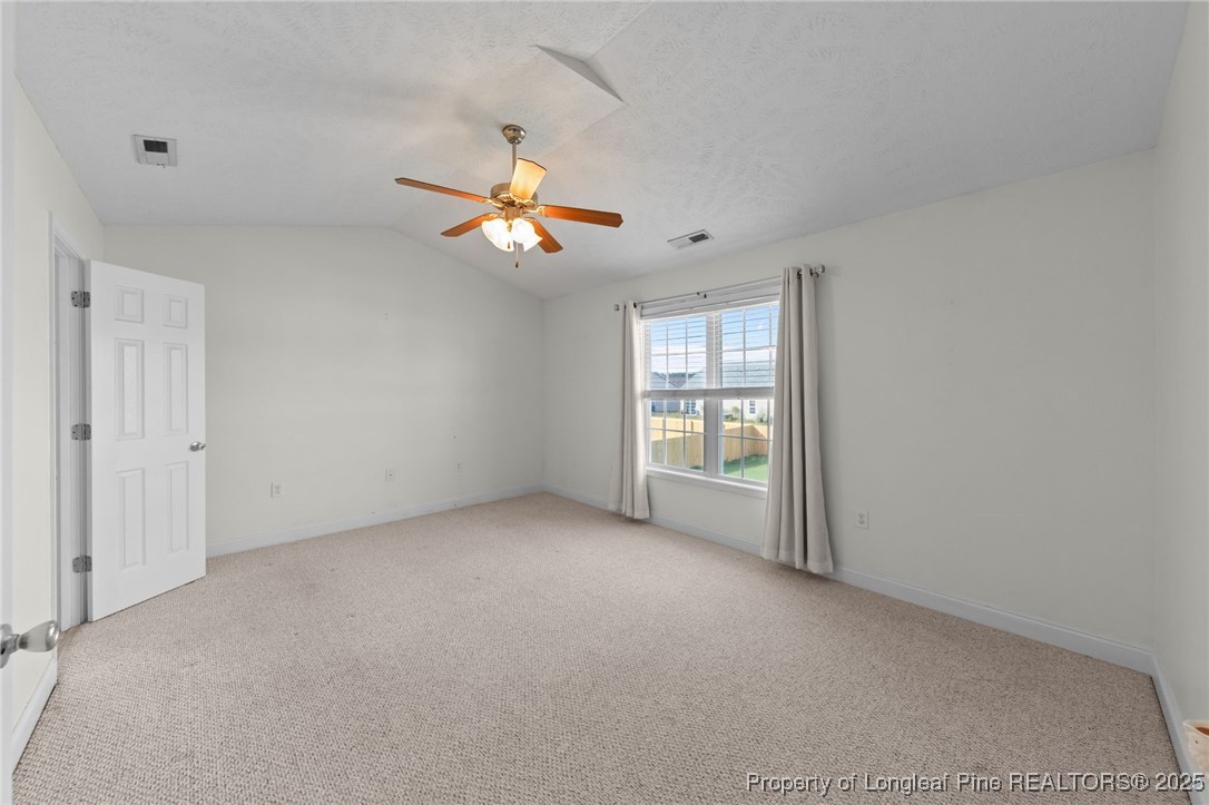 619 Cape Fear Road Raeford, NC 28376 - Photo 14 of 23 wooden floor in an empty room with a window