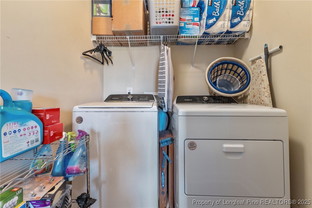 619 Cape Fear Road Raeford, NC 28376 - Photo 20 of 23 a utility room with dryer and washer