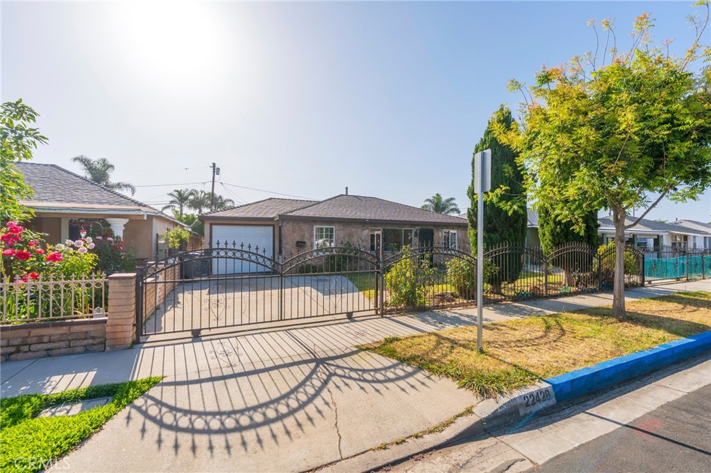 22428 Neptune Avenue Carson, CA 90745 - Photo 1 of 36 a view of a house with swimming pool and sitting area