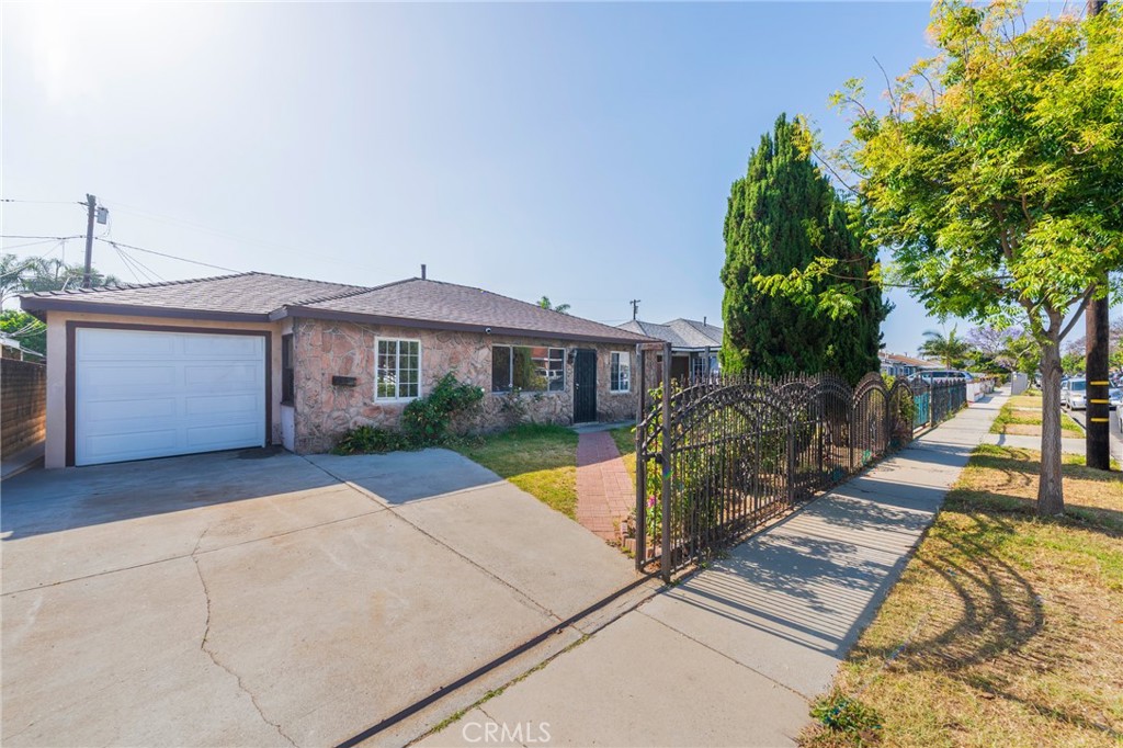 22428 Neptune Avenue Carson, CA 90745 - Photo 35 of 36 a view of house with outdoor space
