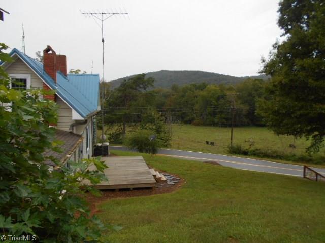 1872 Parsonville Road Purlear, NC 28665 - Photo 4 of 36 side view of home