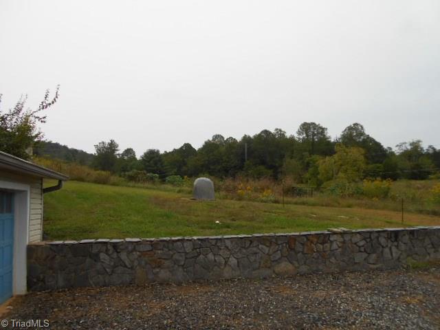 1872 Parsonville Road Purlear, NC 28665 - Photo 32 of 36 stone work walls!