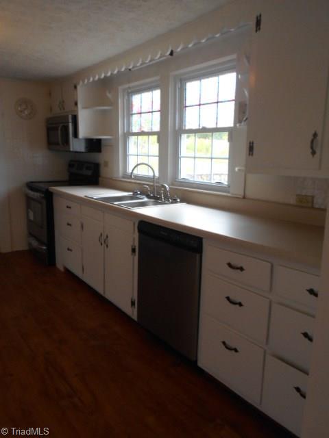 1872 Parsonville Road Purlear, NC 28665 - Photo 9 of 36 new windows throughout