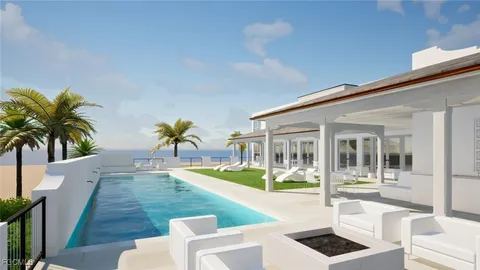 a view of a patio with table and chairs potted plants and palm trees