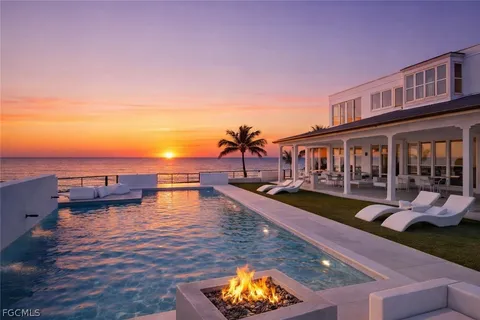 a view of an ocean and a mountain