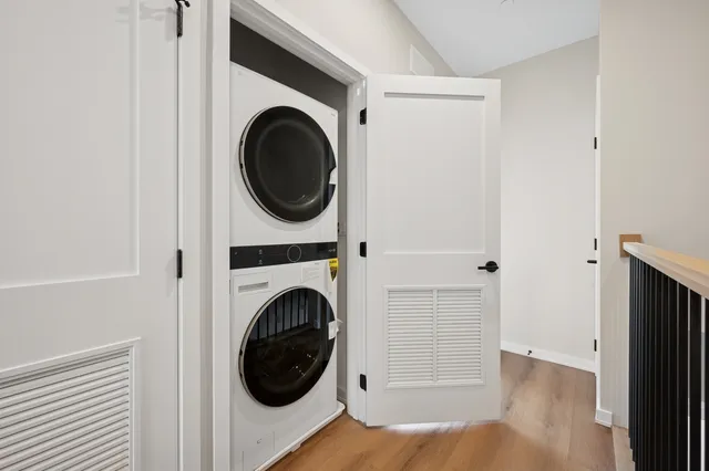 a close view of a utility room with dryer and washer