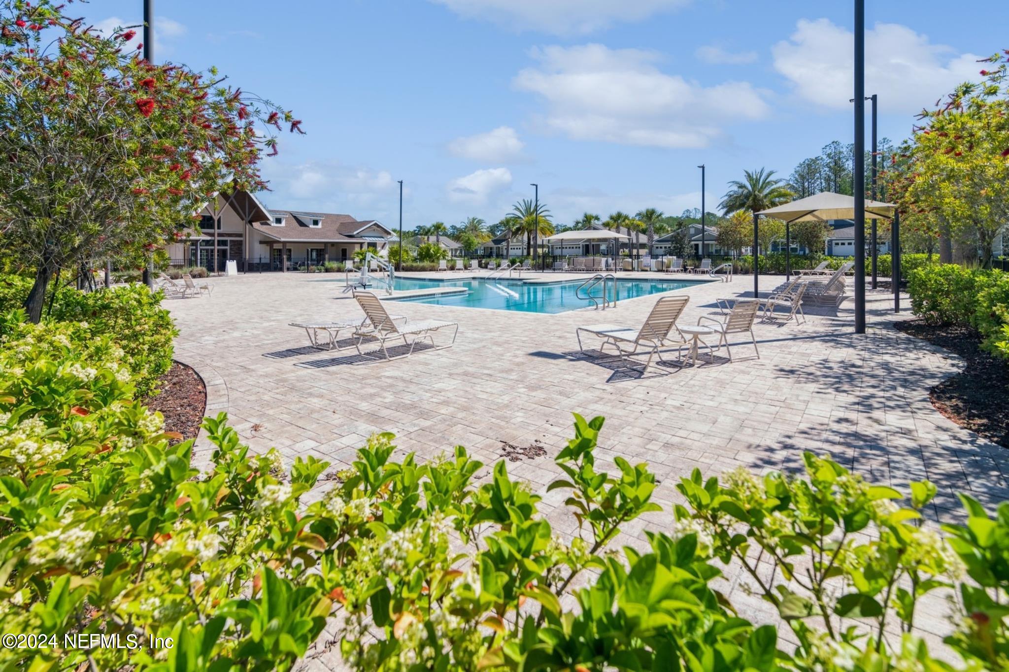 97 Spotted Owl Lane St. Augustine, FL 32095 - Photo 36 of 38 a view of outdoor space with seating area