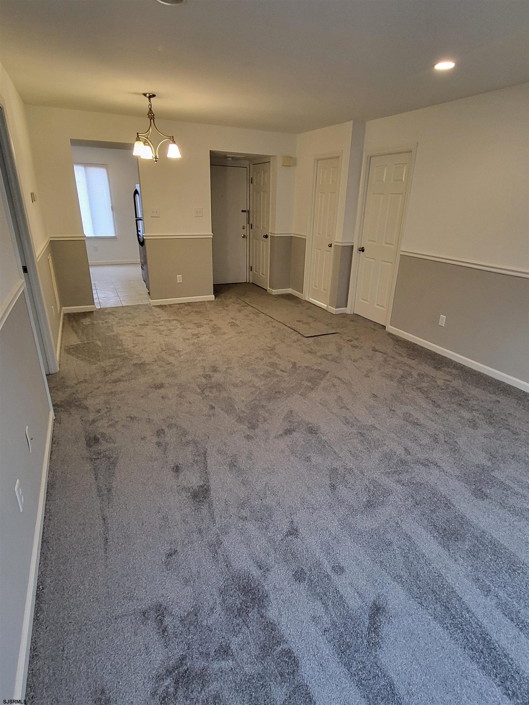 151 Fair Haven Hill Court, Unit 151 Galloway Township, NJ 08205 - Photo 6 of 21 a view of a livingroom with a fireplace