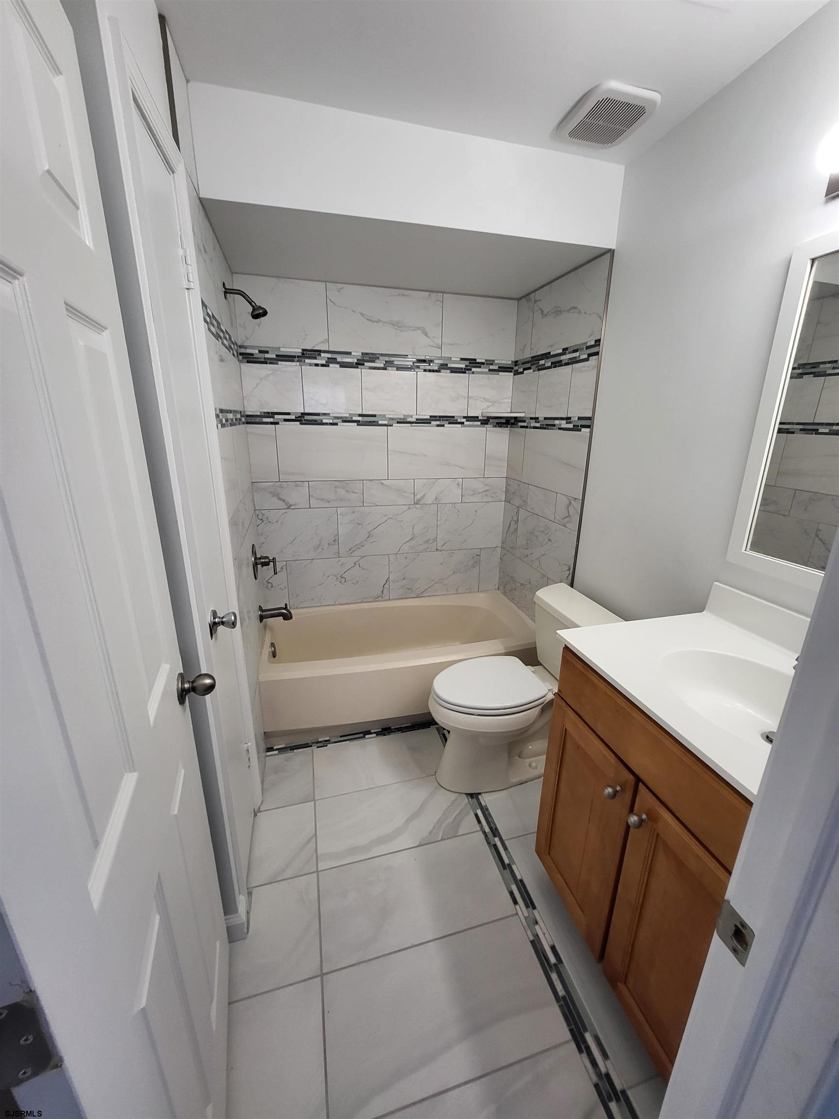 151 Fair Haven Hill Court, Unit 151 Galloway Township, NJ 08205 - Photo 7 of 21 a bathroom with a granite countertop sink toilet and shower