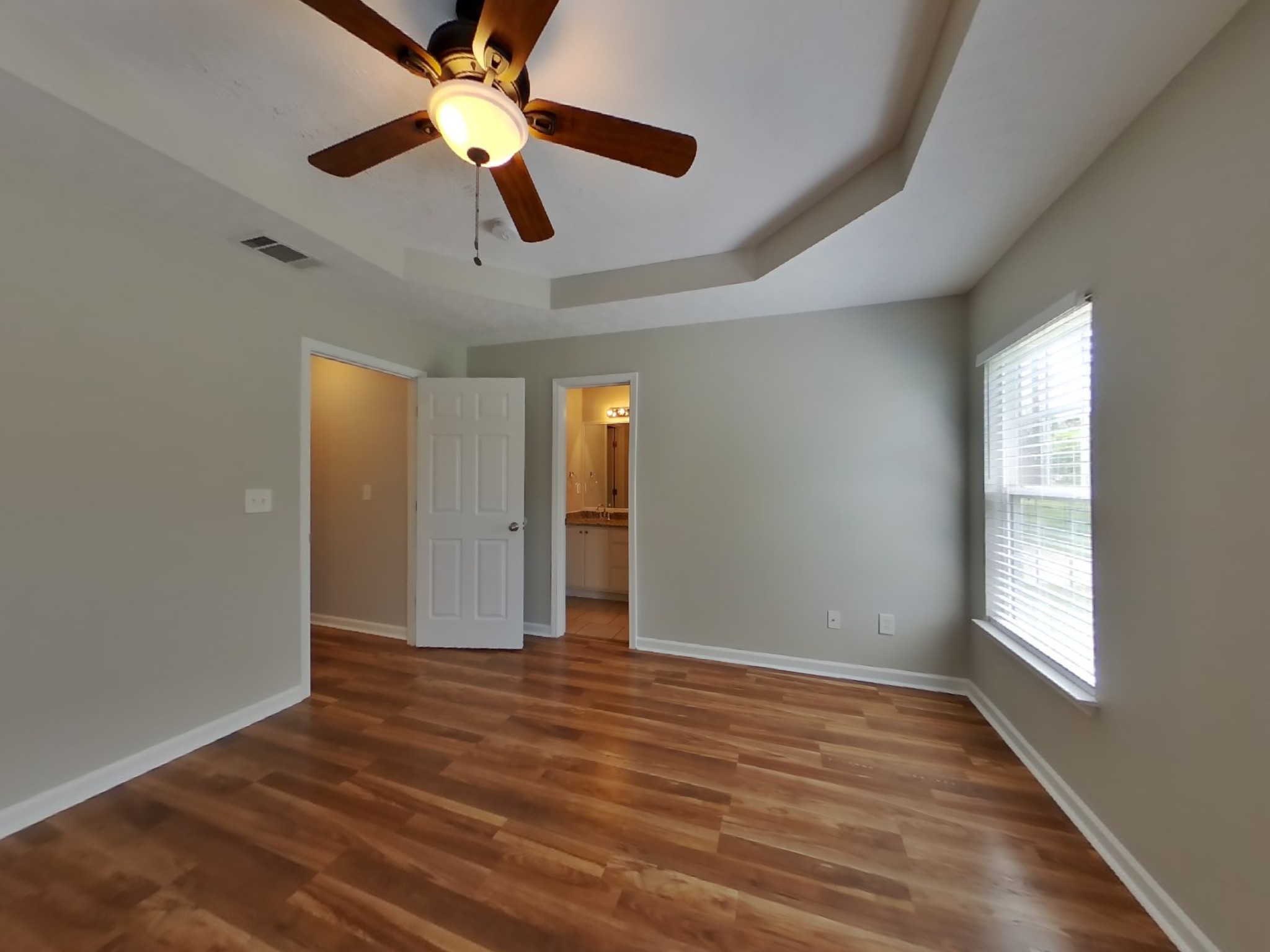3504 Flora Drive Spring Hill, TN 37174 - Photo 8 of 18 wooden floor in an empty room with a window