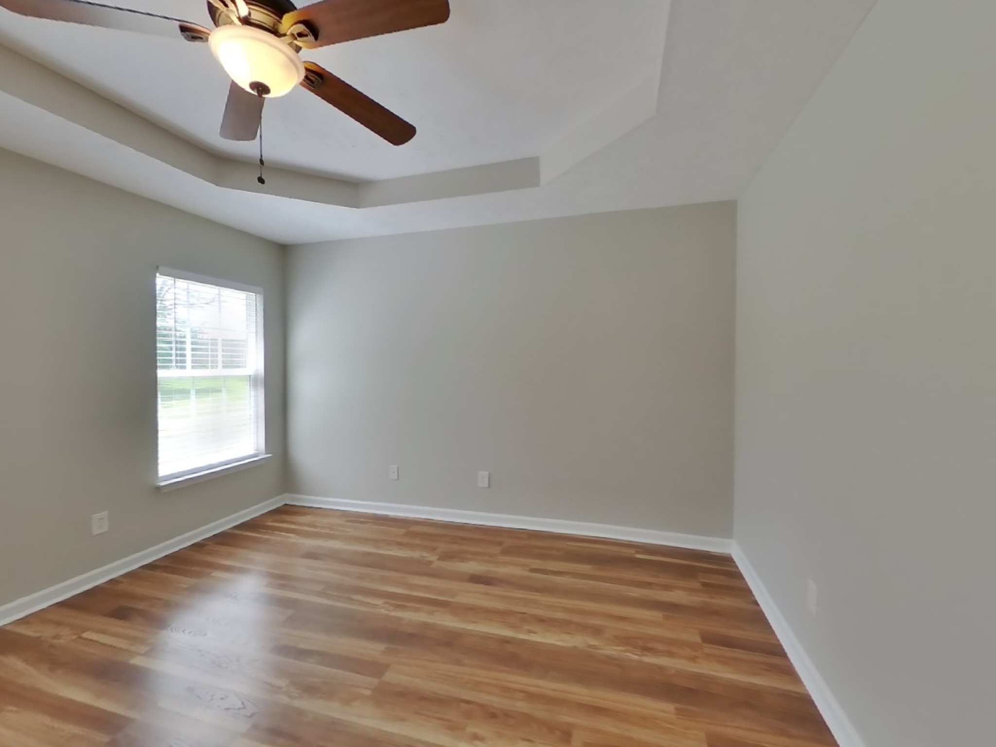 3504 Flora Drive Spring Hill, TN 37174 - Photo 9 of 18 wooden floor in an empty room with a window