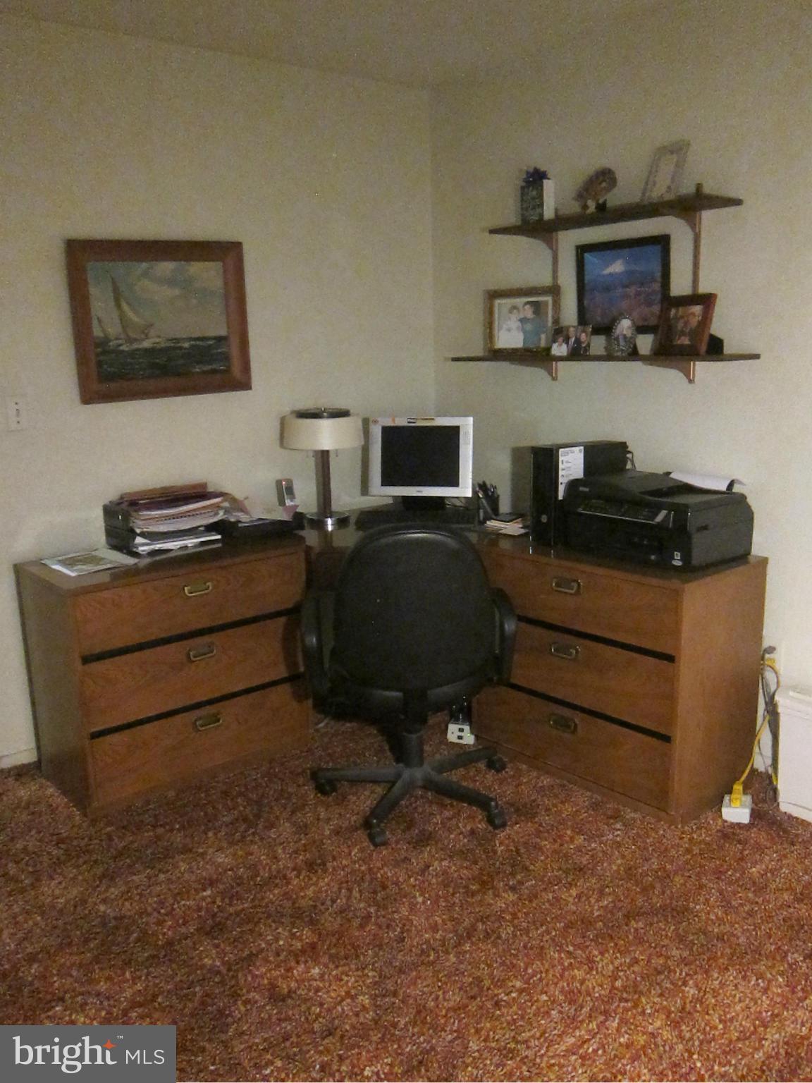 1803 Briggs Road Silver Spring, MD 20906 - Photo 16 of 19 a bedroom with a workspace